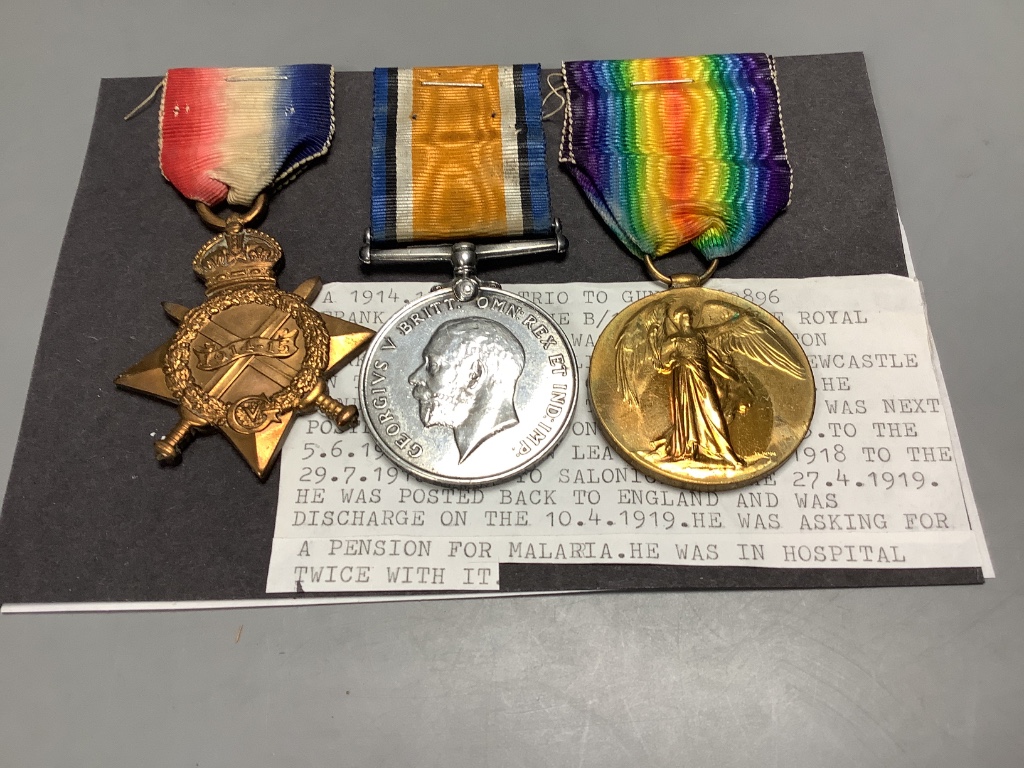 Three groups of WW1 medals